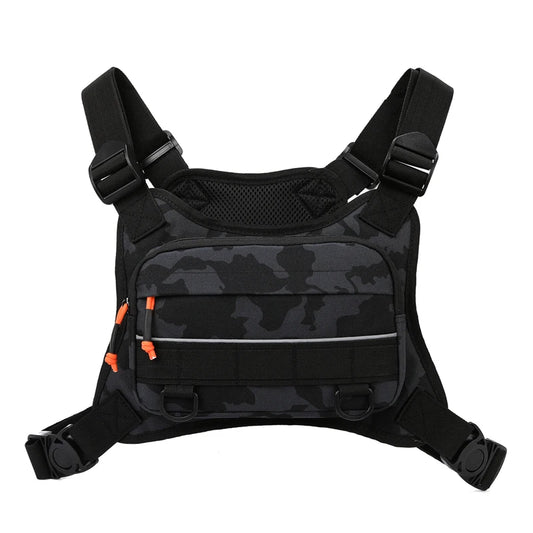 Black camouflage tactical vest with orange accents on a white background