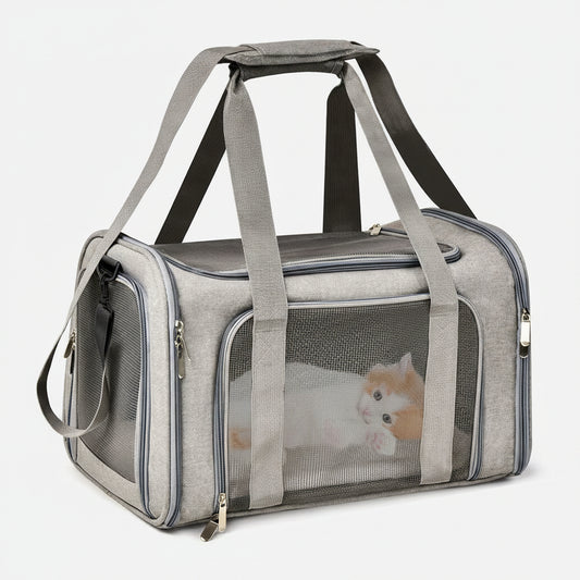 Gray pet carrier with a transparent side panel showing a small dog inside, on a white background.