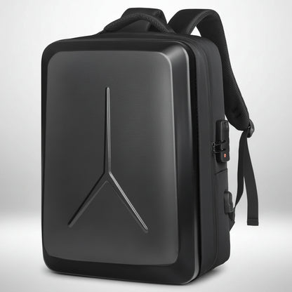 A black tactical backpack with a Y-shaped embossed logo on the front, shown with a side USB charging port connected to a smartphone displaying a battery icon.