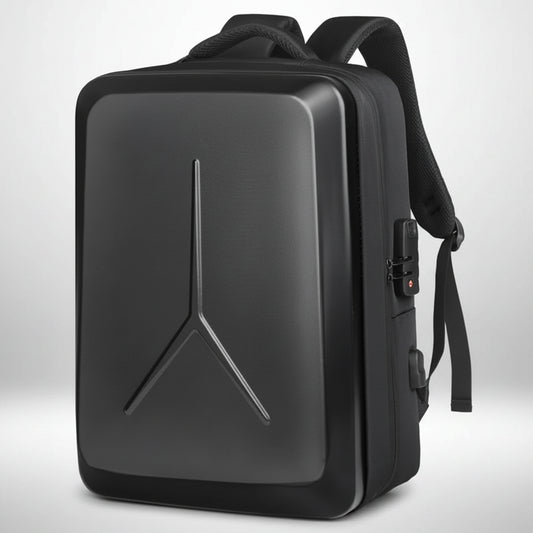 A black tactical backpack with a Y-shaped embossed logo on the front, shown with a side USB charging port connected to a smartphone displaying a battery icon.