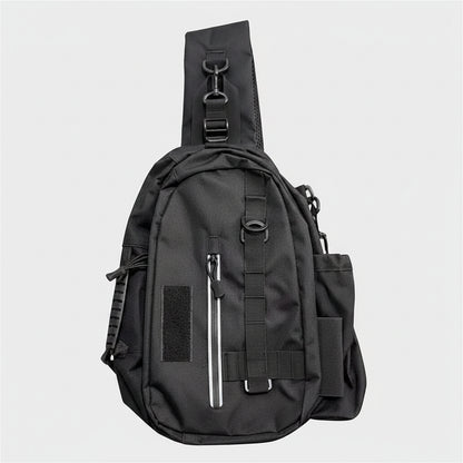 A black tactical sling backpack with multiple zippered pockets and adjustable straps, shown against a plain white background.