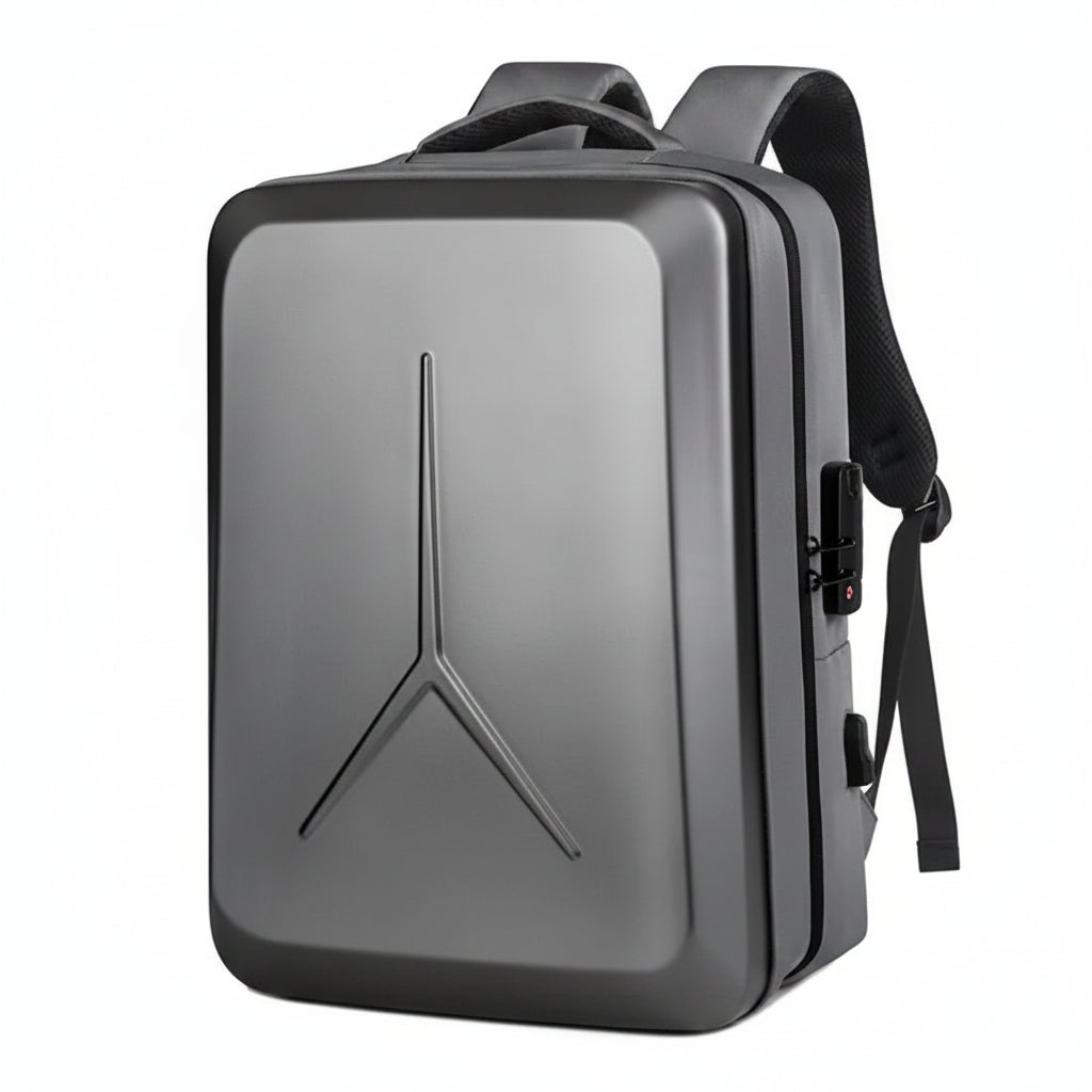 A dark gray hard-shell laptop backpack with a prominent Y-shaped logo on the front, black straps, and a side lockable compartment, shown on a plain white background.