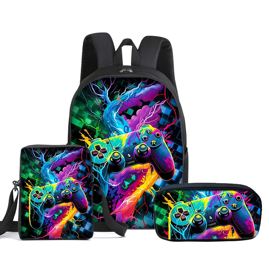 A gaming-themed backpack set with a matching zippered pouch and a slim pencil case, all featuring a vibrant, colorful neon design of video game controllers with lightning effects on a black background.