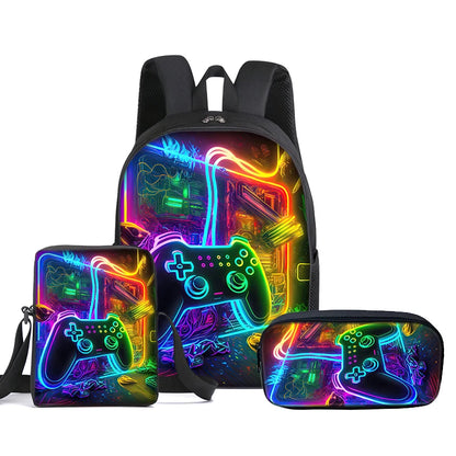 A gaming-themed backpack set with a matching zippered pouch and a slim pencil case, all featuring a vibrant neon video game controller design on a black background.