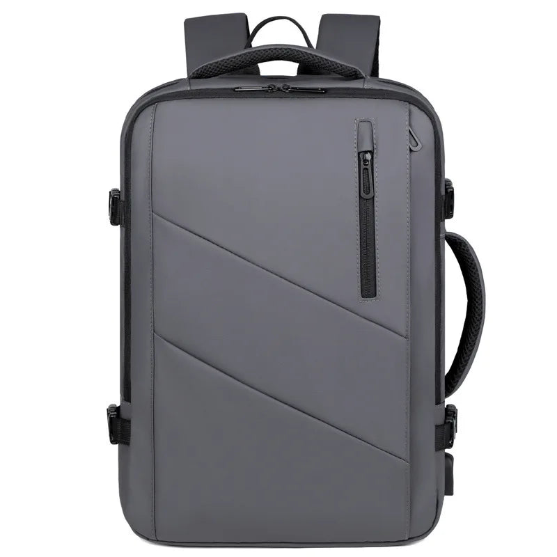 A gray and black laptop backpack with diagonal paneling on the front, a vertical zippered pocket, and padded shoulder straps, shown against a plain white background.