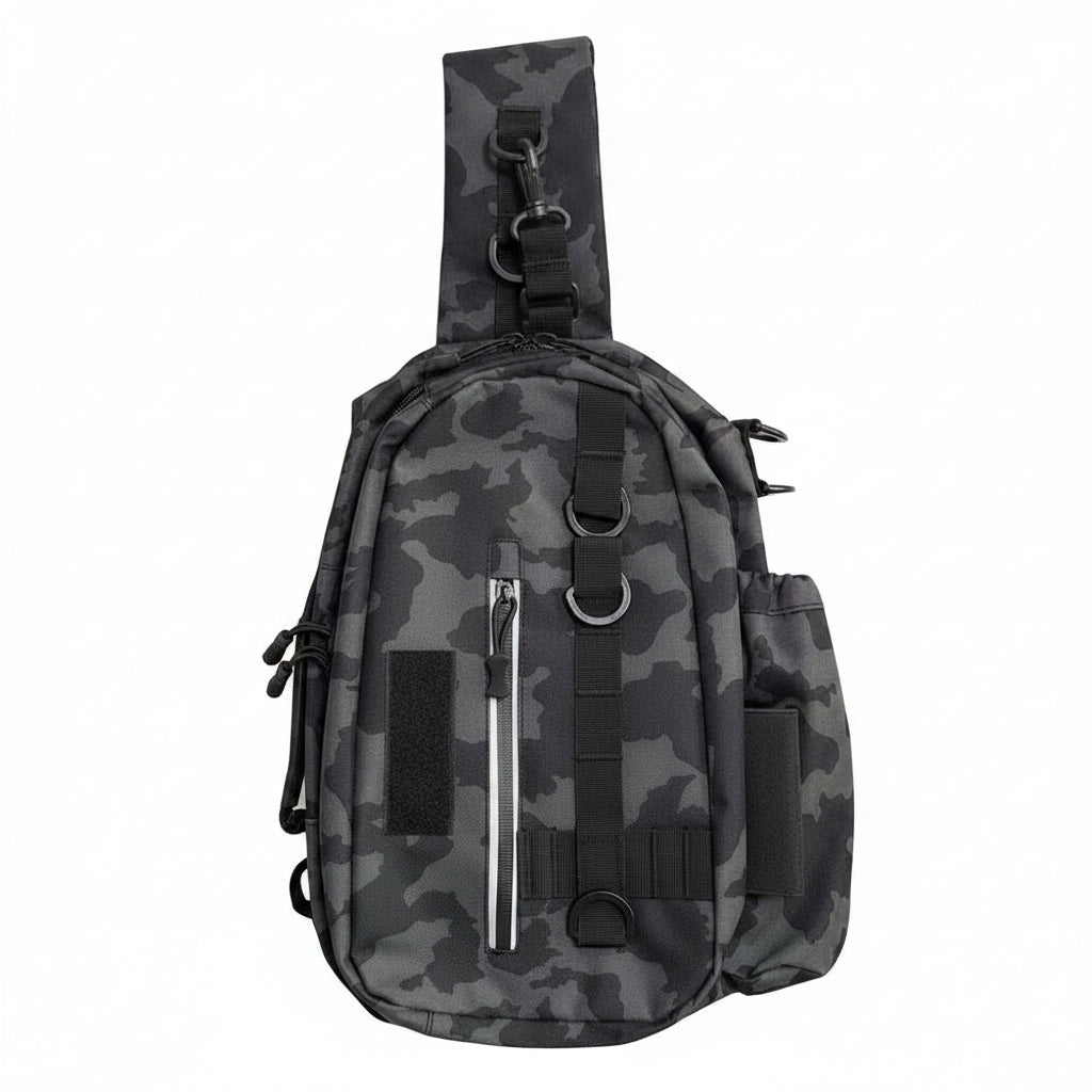 A tactical-style sling backpack in a dark gray and black camouflage pattern, featuring a wide shoulder strap, multiple zippered pockets, and webbing straps, shown against a plain white background.