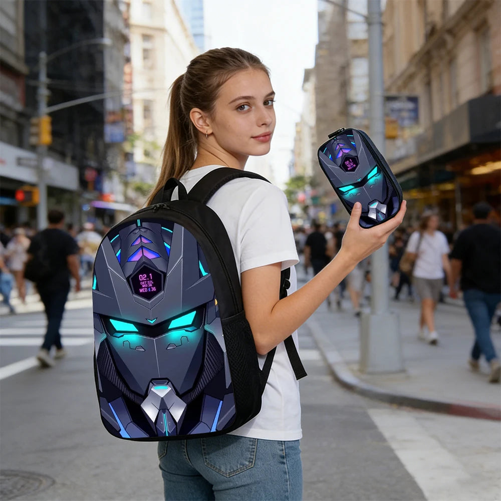 A woman on a city street carries a black backpack with a glowing blue and purple robot face design, while holding a matching rectangular accessory in her hand.