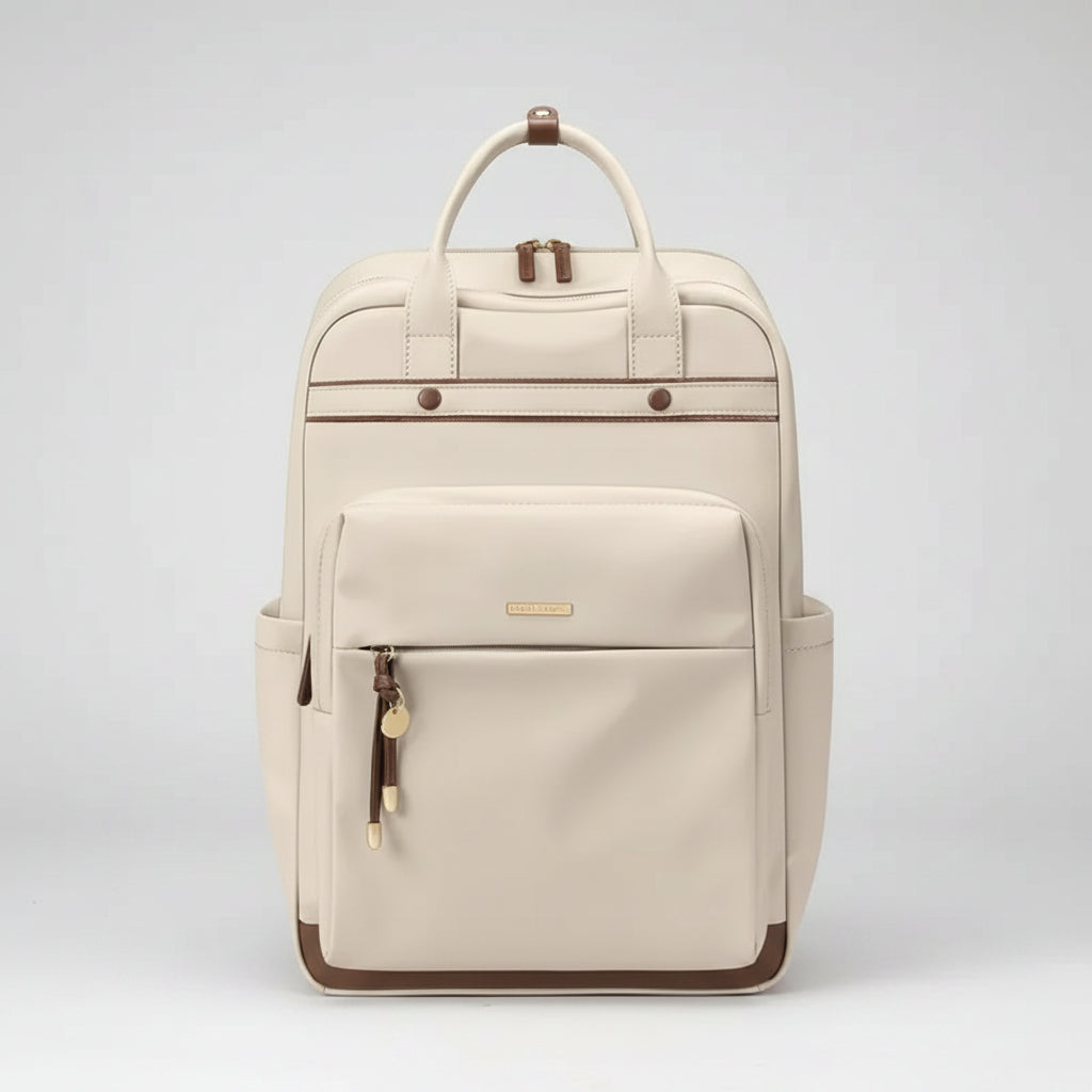 An off-white backpack with brown trim and gold-tone hardware, featuring a top handle, side pockets, and a front zippered compartment.