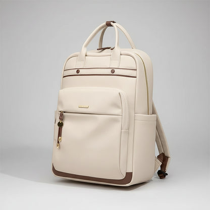 An off-white leather backpack with brown trim and gold-tone hardware, shown on a pink surface against a split white and sage green background. The brand name 'GOLF' is visible in the top left corner.