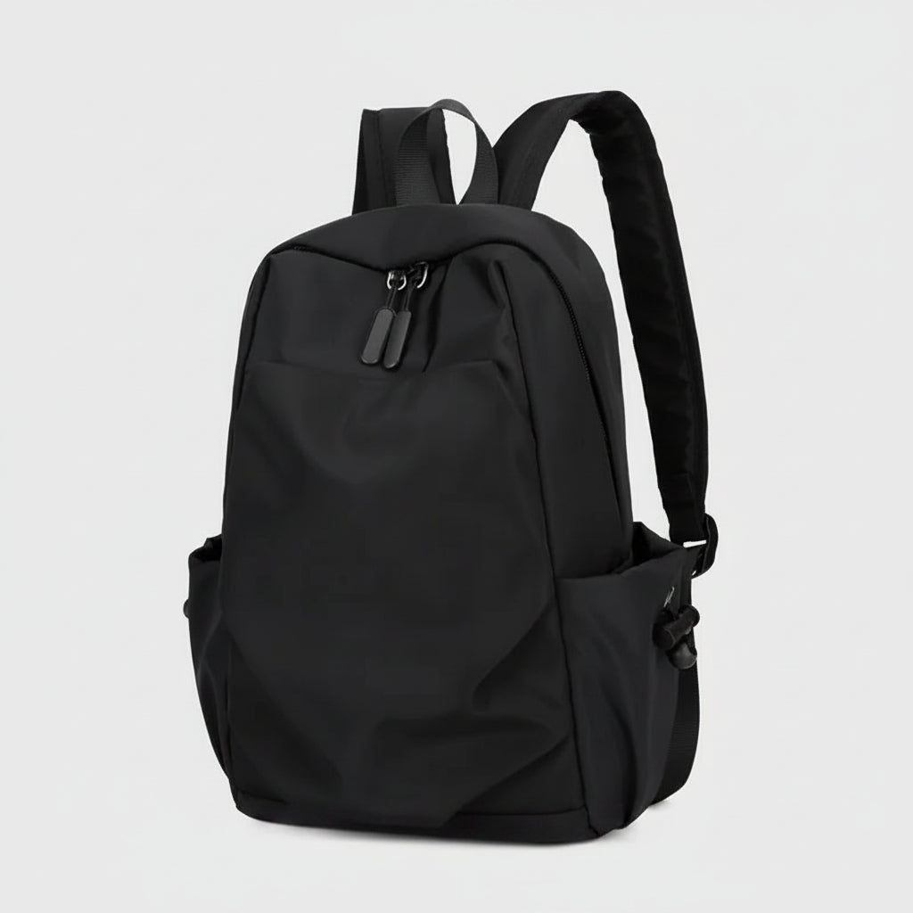 Black backpack on a white background