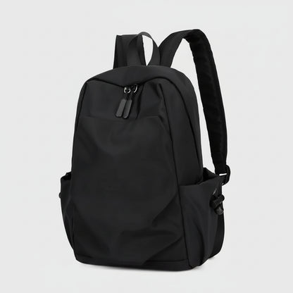 Black backpack on a white background