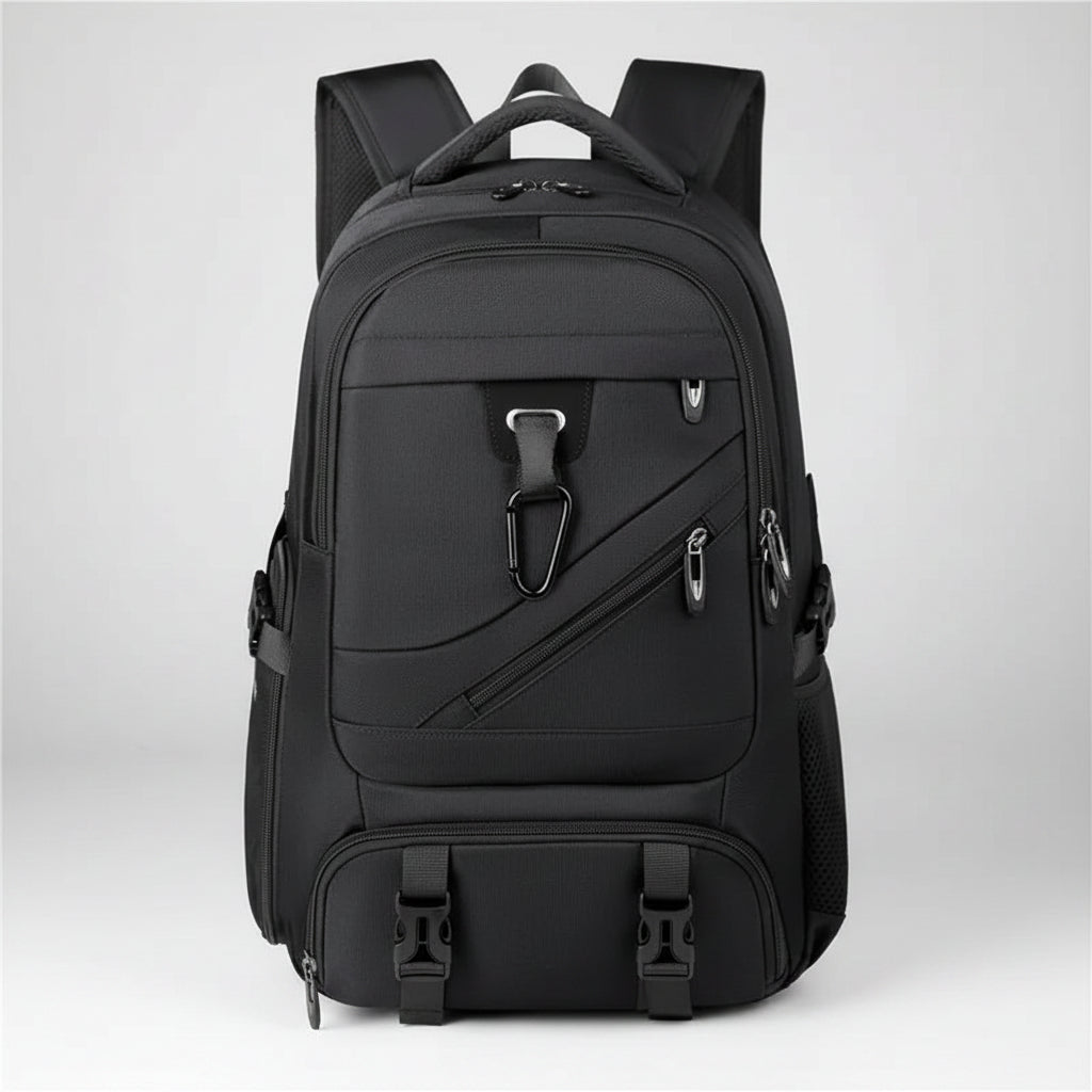Black backpack with multiple pockets and straps on a white background