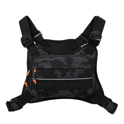 Black camouflage tactical vest with orange accents on a white background