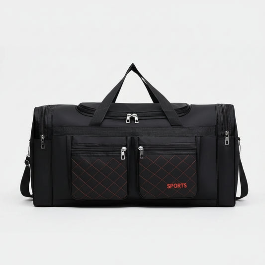 Black duffel bag with multiple pockets and zippers on a white background