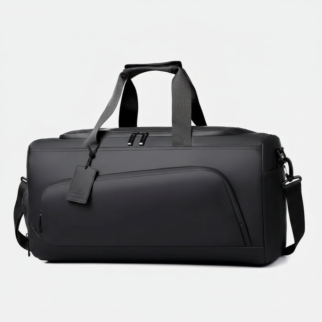 Black duffel bag with shoulder strap on a white background