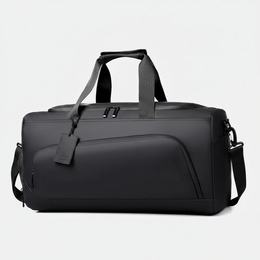 Black duffel bag with shoulder strap on a white background
