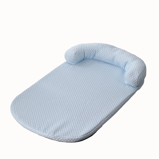 Blue baby nest with waffle texture on a white background