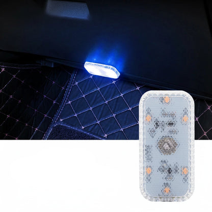 Blue touch LED light on a dark textured surface with packaging in the foreground.