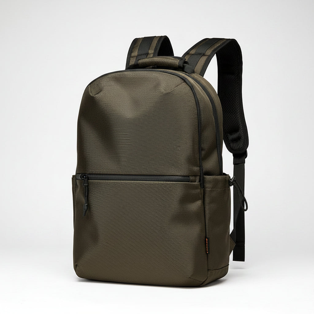 Brown backpack with black straps on a white background
