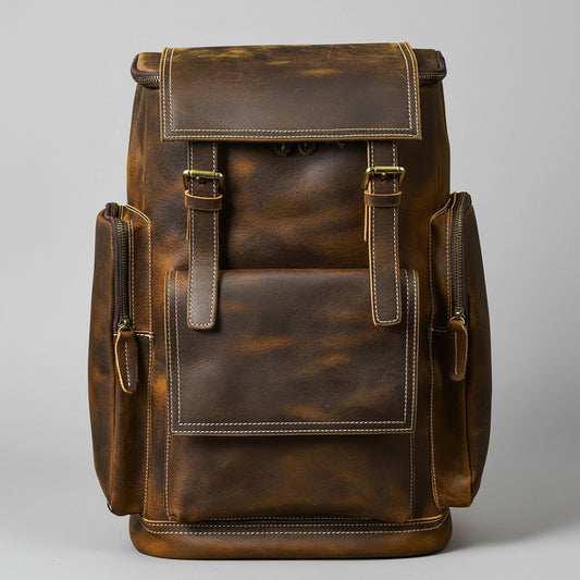 Brown leather backpack on a white background
