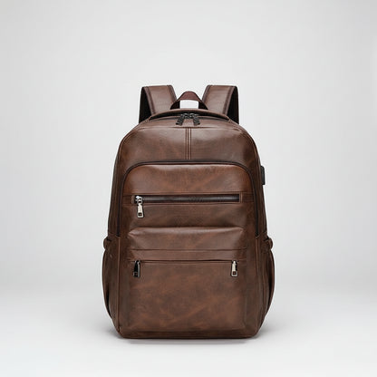 Brown leather backpack on a white background