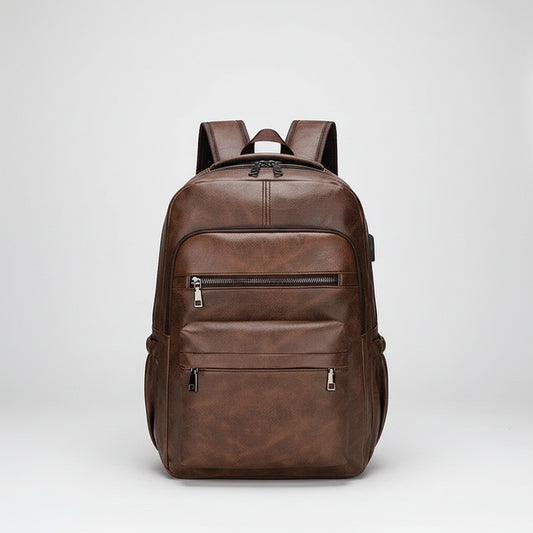 Brown leather backpack on a white background
