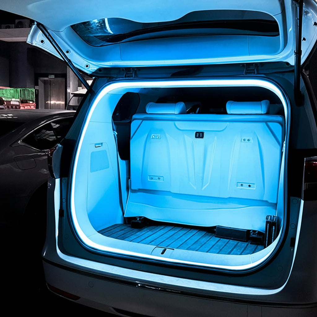 Car trunk with ice blue interior lighting