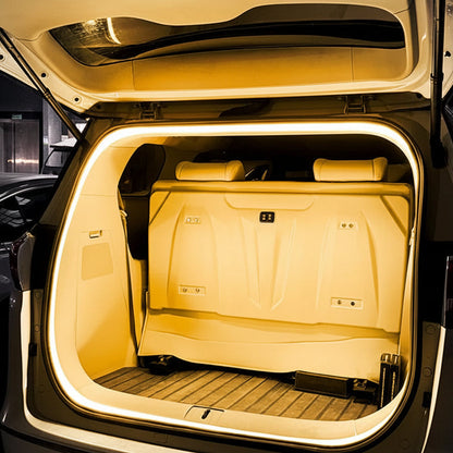 Car trunk with warm white interior lighting