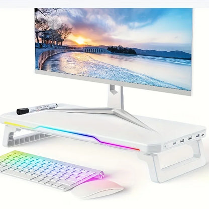 Computer monitor with landscape display, keyboard, and mouse on a white background