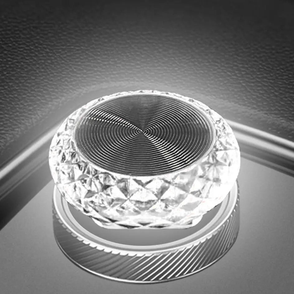Crystal-like LED light on a reflective surface with 'White Light USB Angel Eye' text.