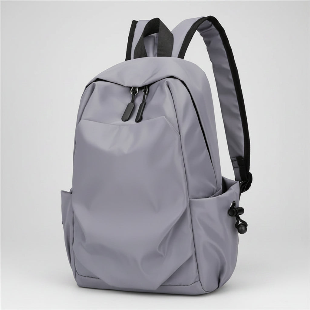 Gray backpack with black straps on a white background