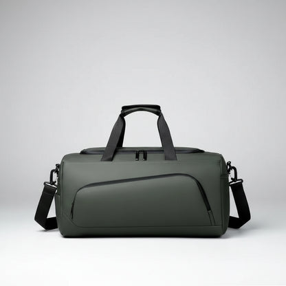 Gray duffel bag with black straps on a white background
