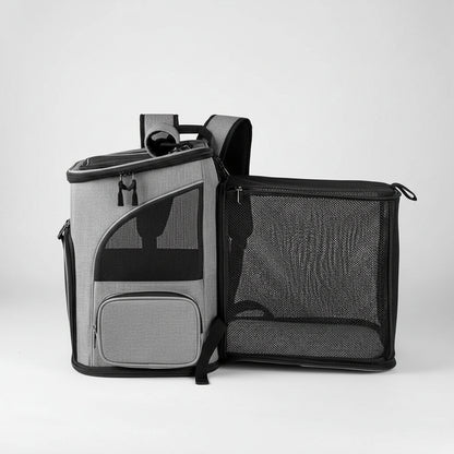 Gray pet carrier backpack with mesh sides on a white background