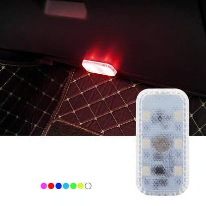 Multicolor touch LED light with packaging on a dark background