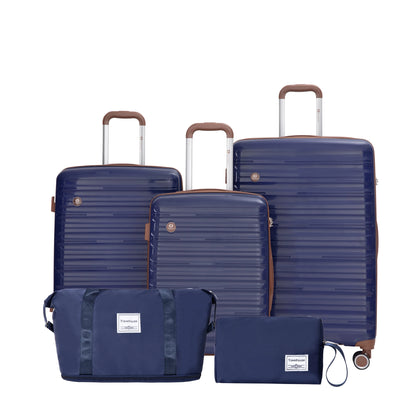 Set of blue suitcases and travel bags on a white background