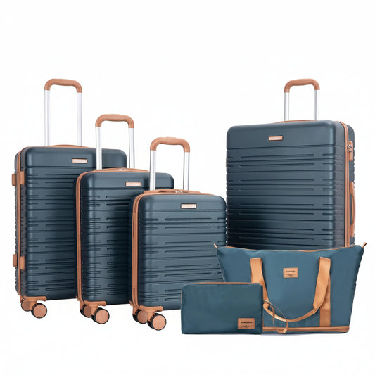 Set of blue suitcases with brown handles and wheels on a white background