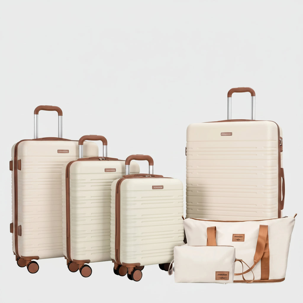 Set of cream-colored luggage with brown handles and wheels on a white background