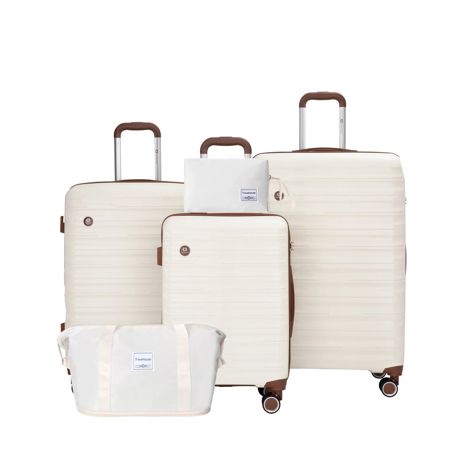 Set of cream-colored luggage with matching travel bags on a white background