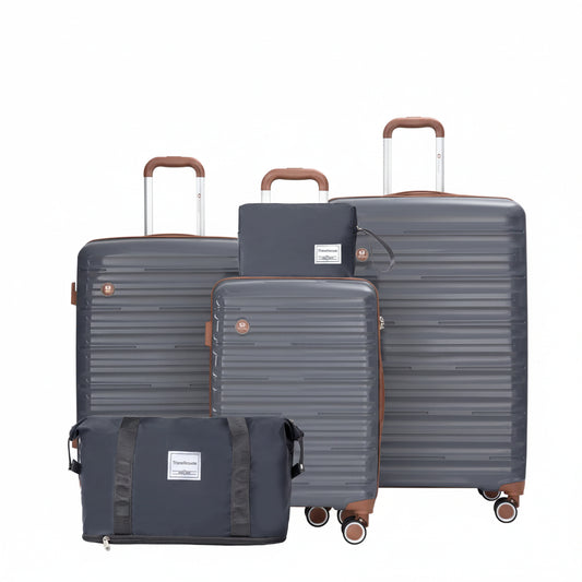 Set of gray suitcases with brown handles and wheels on a white background
