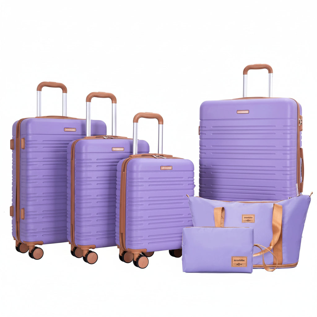 Set of purple suitcases with brown handles and wheels on a white background
