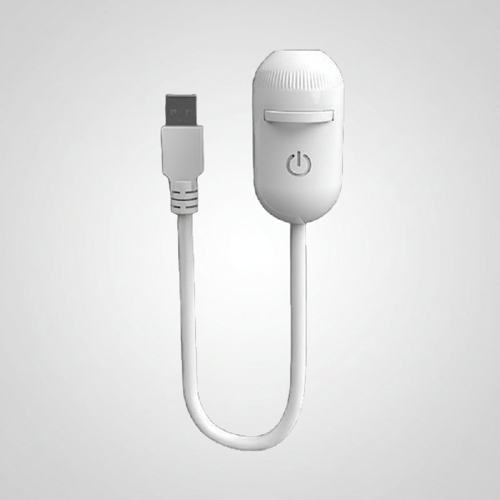 White electronic device with USB cable on a white background
