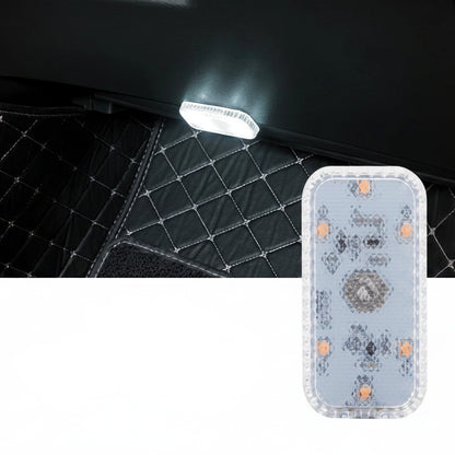 White touch LED light on a car interior with decorative patterned case.