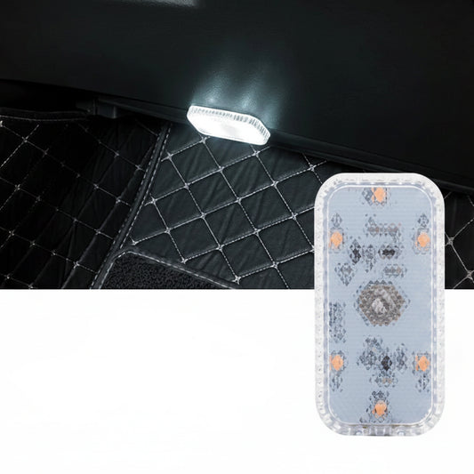 White touch LED light on a car interior with decorative patterned case.